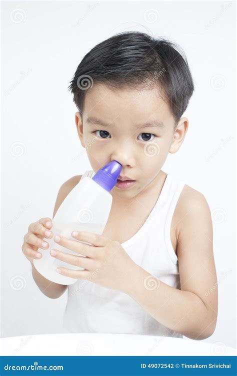 Children Nasal Clean by Saline Solution Stock Photo - Image of saline, face: 49072542