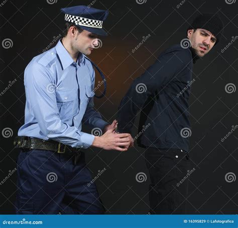 Police Arrest _ Officer and Thief Stock Image - Image of blue, illegal ...