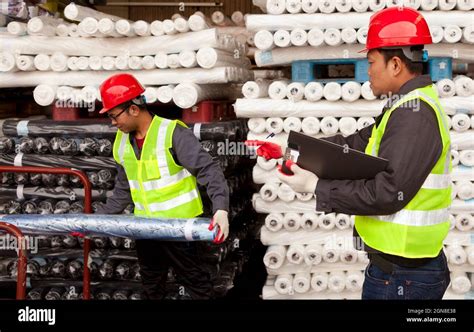 Textile factory workers on working Stock Photo - Alamy