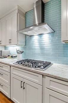 glass backsplashes for kitchens the reflective quality of this kitchen s blue glass tile glass backsplashes for kitchens the reflective quality of this kitchen s blue glass tile