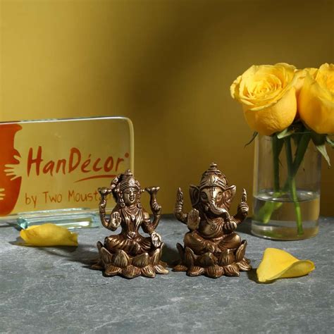 Buy Laxmi Ganesh on Lotus Set Brass Showpiece Online at Best Price