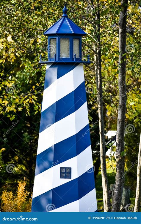 Blue and White Lighthouse with Stripes Stock Image - Image of fontana ...