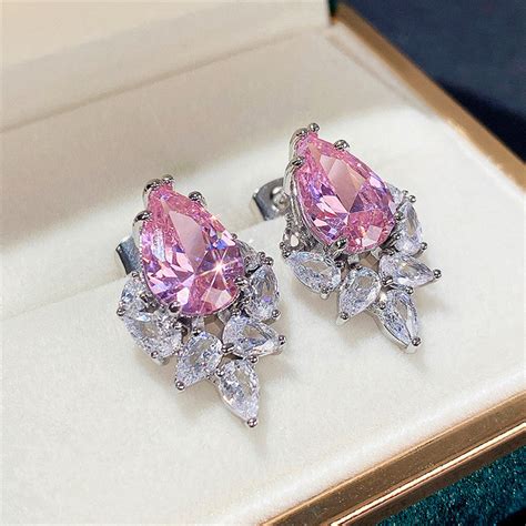 Silver Plated American Diamond Studded Crushed Ice Cut Drop Earrings ...