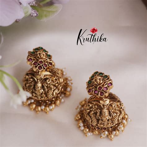 Beautiful Lakshmi Peacock Jhumkas with Golden Beads Drops E753 ...