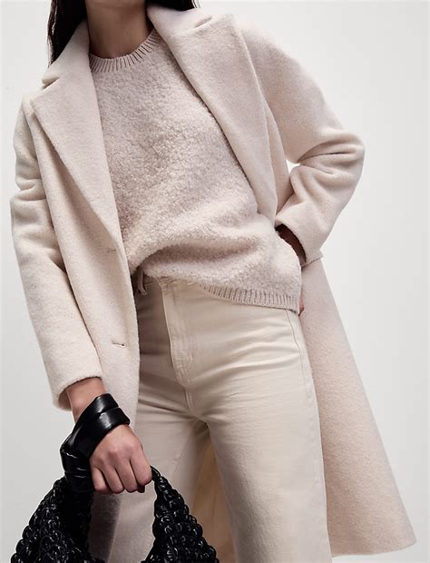 Buy Textured Crew Neck Knitted Vest at Marks & Spencer