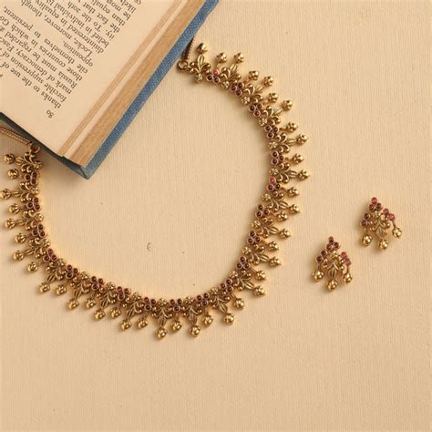 Buy Alala Gold Plated Tribal Necklace Set | Tarinika - Tarinika India