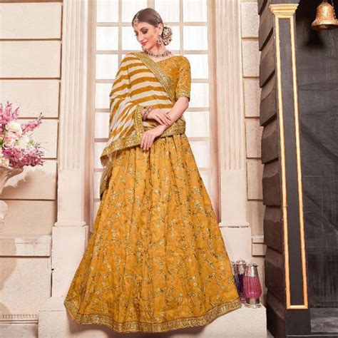 Blissful Yellow Colored Party Wear Embroidered Phantom Art Silk Lehenga ...