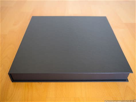 Ein Fotobuch mit einer Geschenkbox von Saal-Digital – Die Welt in ...