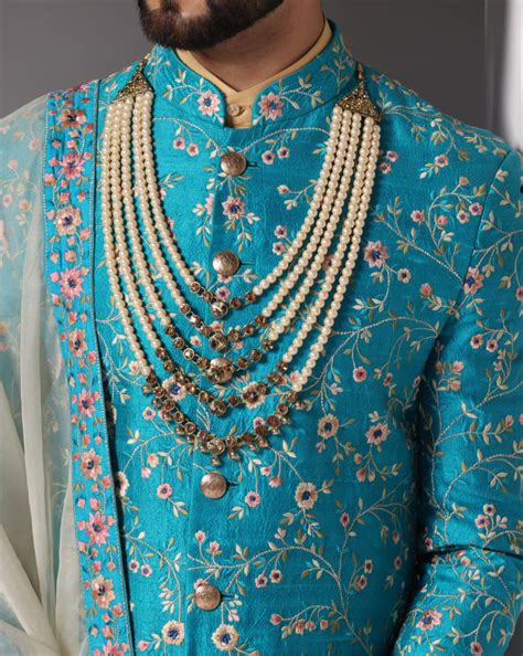 Teal Elegance: All-Over Zari and Thread Embroidery Sherwani Set
