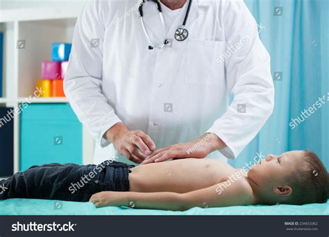 Image Pediatrician Doing Abdominal Examination Stock Photo 234653362 | Shutterstock