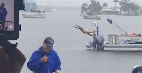 Man Wearing American Flag Speedo Belly Flops Into Water Behind Reporter ...