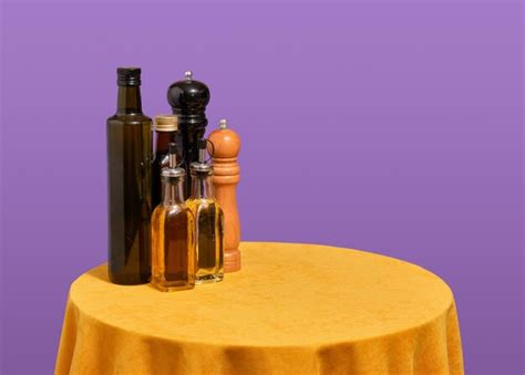 Beautiful table setting and various spices oils copy space for text ...
