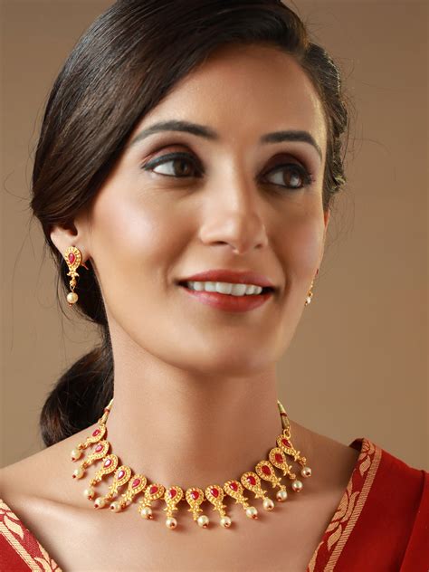 Priyaasi Pink Stone Studded Gold Plated Floral Jewellery Set