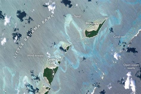 Astronaut captures breathtaking photo of glowing sandbanks that look ...