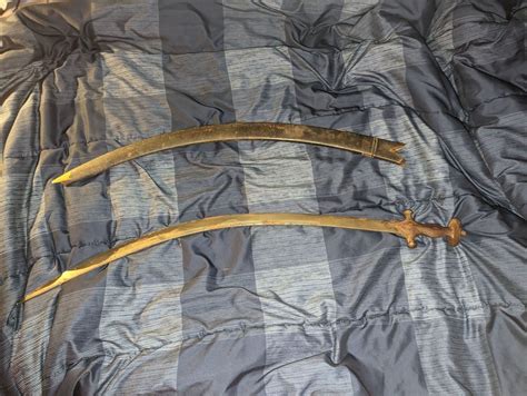 I have an 875 (ish) year old scimitar sword and I would like to know it ...