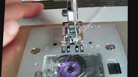 Image result for Threading Bobbin On Singer Simple