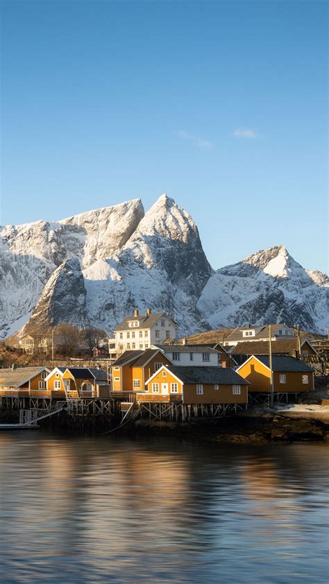 Download wallpaper 2160x3840 houses, pier, mountains, snow, sea samsung ...
