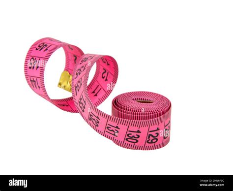 Pink tape measure roll isolated on the white background Stock Photo - Alamy