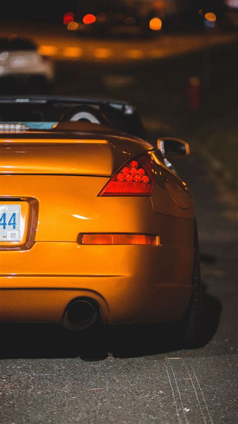Download wallpaper 2160x3840 car, sports car, rear view, yellow ...