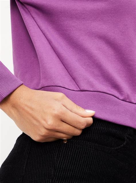 Buy Women Solid Drop Shoulder Sweatshirt Online at just Rs. 499.0 ...