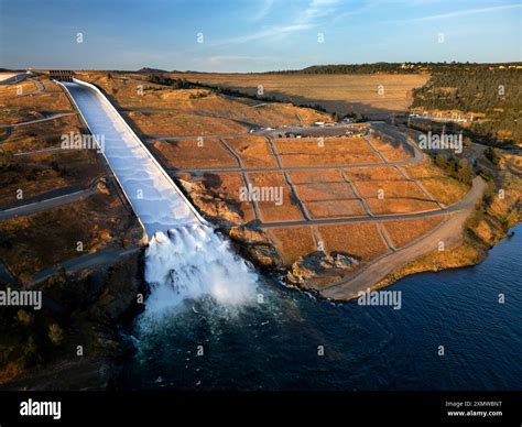 Aerial view of the Lake Oroville Dam with the new spillway in action ...