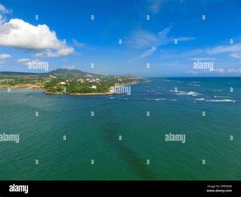 Ships, boats, containers, Puerto Plata harbor, port and cityscape of the industrial zone ...