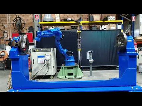 Sel las dengan Motoman Ea1900, pengontrol Nx100, positioner dan mesin ...