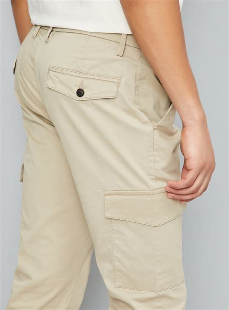 Buy Men Solid Slim Fit Cargo Trousers Online at just Rs. 1499.0 ...