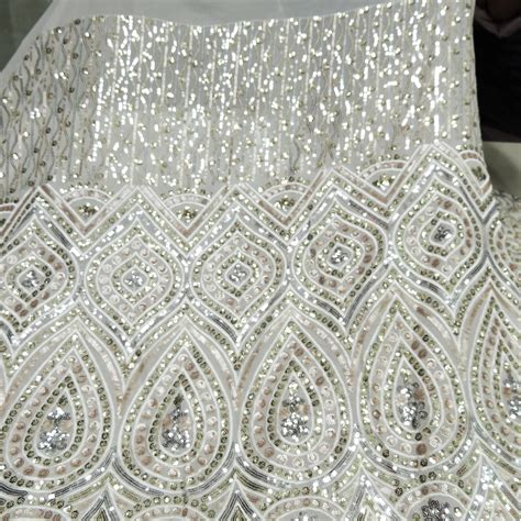 All Over Sequins Cut Work Embroidery On White Dyeable Georgette Fabric ...