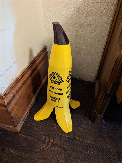 Wet floor sign that looks like a banana peel : r/bananawetfloorsign
