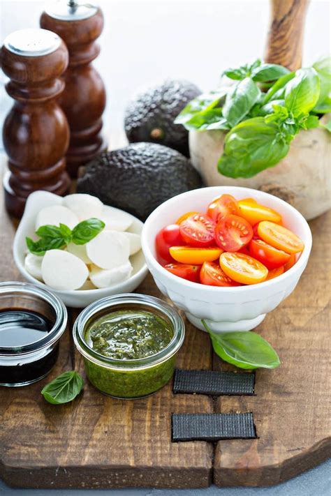 Caprese Stuffed Avocado: a refreshing caprese salad is tossed with a ...