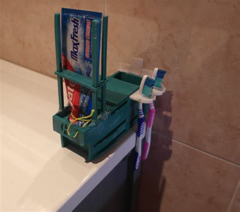 Image result for How Do You Set Up a Toothpaste Dispenser