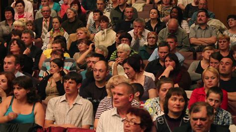 Crowd sitting in the audience of indoor show 14466750 Stock Video at ...