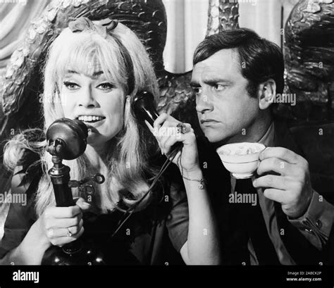 FRENCH DRESSING, from left: Marisa Mell, James Booth, 1964 Stock Photo ...