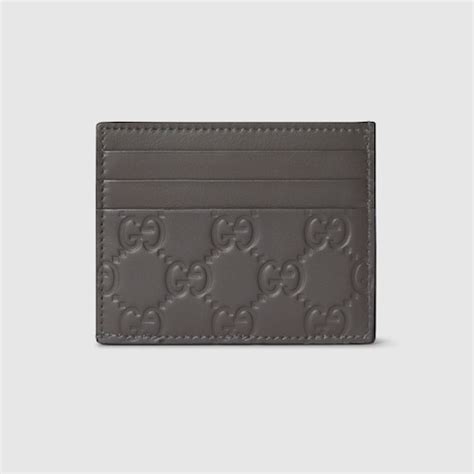 GG Emblem card case in grey GG leather | GUCCI® US