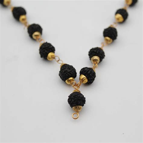 Original Black Rudraksha Mala 36 Beads With Golden Cap – dharmsaar