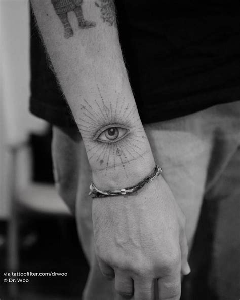 inner arm eye tattoo
