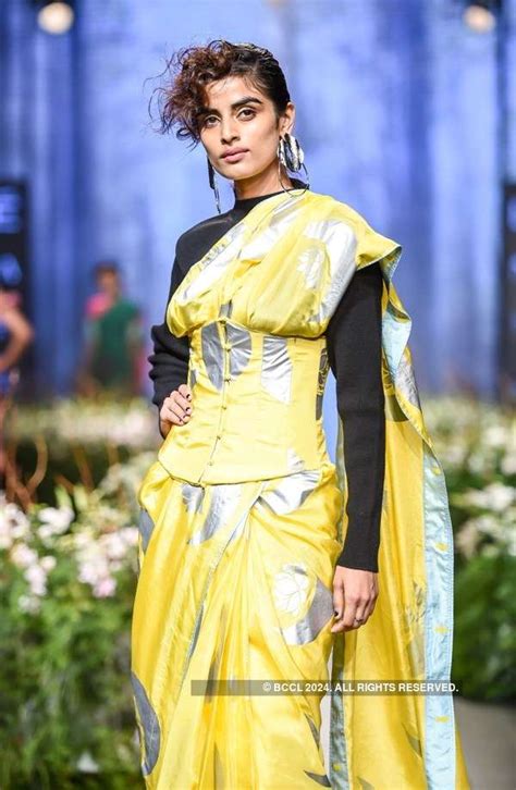 A model flaunts a dress by designer Masaba Gupta on Day 1 of the Lakme ...