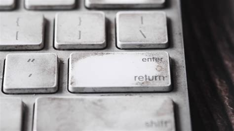 Dirty keyboard enter return key button 14205701 Stock Video at Vecteezy