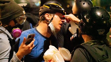Portland protests: Police declare riot as violence grows