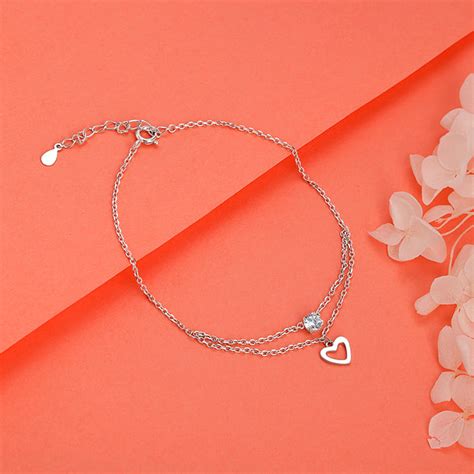 Buy Silver Curl Heart Anklet at Best Price – GIVA