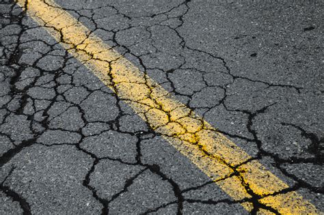 How to Repair Cracks in Your Asphalt: A Step-by-Step Guide - Sunrise ...