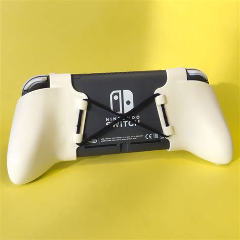 STL file Nintendo Switch Lite - Ergonomic Grip (2-in-1) 🕹️・3D printable ...