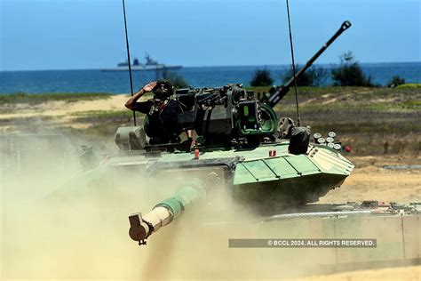 Armed Force personnel stage a demo after the curtain raiser press ...