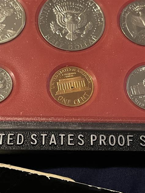 1980 proof set with hole in back of penny : r/coins