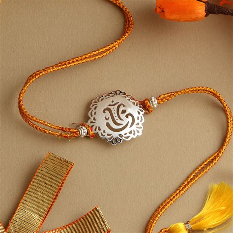 Completely handcrafted Rakhi, available in multiple variants. – Code Silver