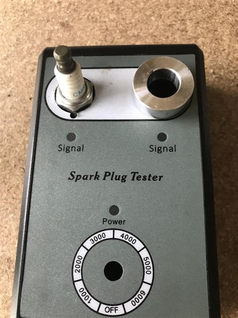 Check Small Engine Spark Plug with Multimeter 的图像结果