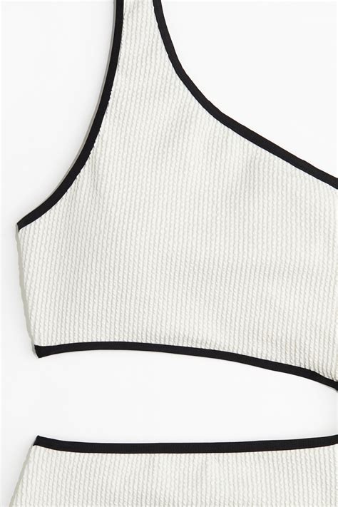 One-shoulder cut-out swimsuit - White/Black - Ladies | H&M IN