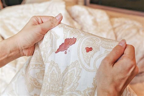 How to Get Blood Out of Sheets, According to Laundry Experts