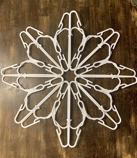 White Plastic Coat Hanger Snowflake at Ana Means blog